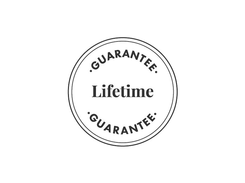 May include: Black and white circular stamp with the text "Lifetime Guarantee" in a bold font.