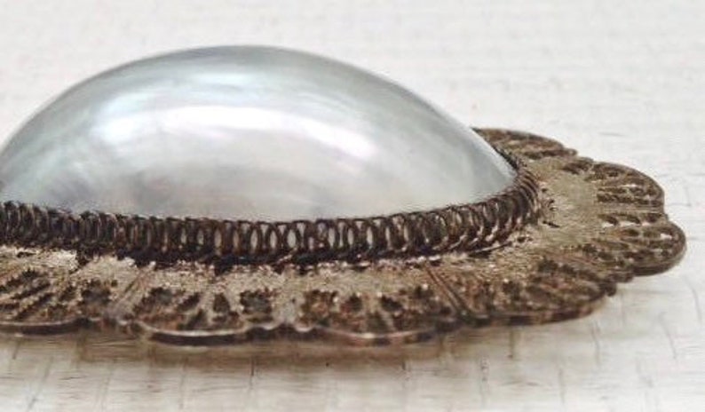 Antique Edwardian Romantic Rare Oversized Shimmering Mother of Pearl Brooch with Hand Wrought Silver Filigree Surround