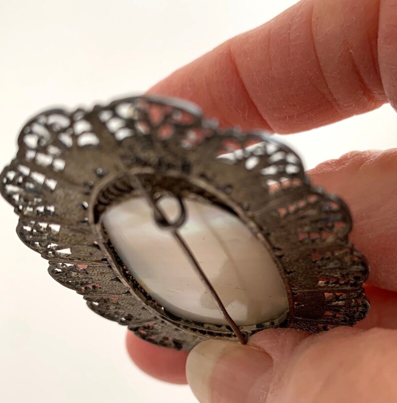 Antique Edwardian Romantic Rare Oversized Shimmering Mother of Pearl Brooch with Hand Wrought Silver Filigree Surround