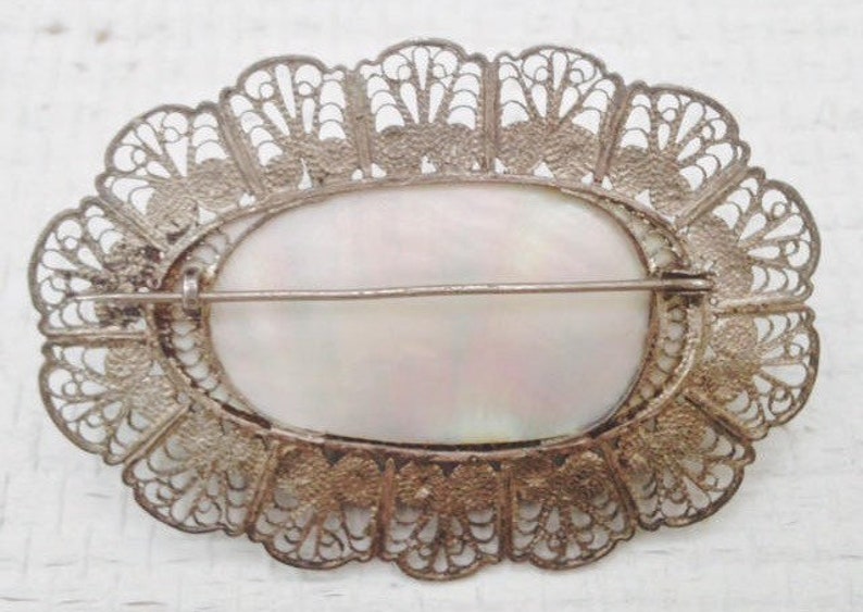 Antique Edwardian Romantic Rare Oversized Shimmering Mother of Pearl Brooch with Hand Wrought Silver Filigree Surround