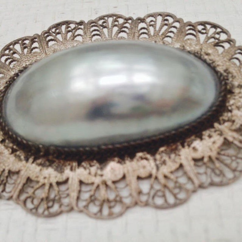 Antique Edwardian Romantic Rare Oversized Shimmering Mother of Pearl Brooch with Hand Wrought Silver Filigree Surround
