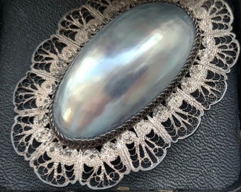 Antique Edwardian Romantic Rare Oversized Shimmering Mother of Pearl Brooch with Hand Wrought Silver Filigree Surround