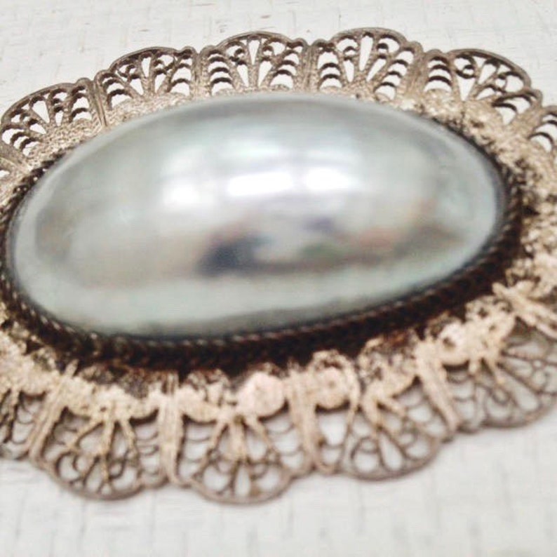 Antique Edwardian Romantic Rare Oversized Shimmering Mother of Pearl Brooch with Hand Wrought Silver Filigree Surround