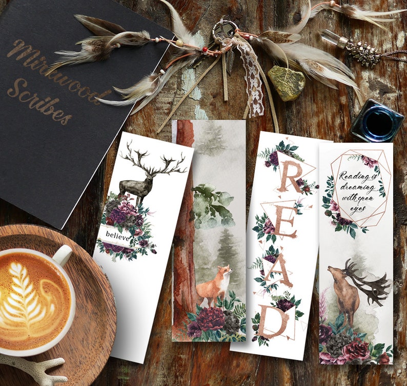 May include: Set of four bookmarks featuring watercolor illustrations of a deer, a fox, floral designs, and the word "READ" in gold lettering. The bookmarks are printed on white cardstock and have a rustic, woodland theme.