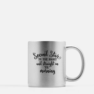 May include: A silver mug with a black inscription that reads "Second Star to the Right and straight on 'til morning".