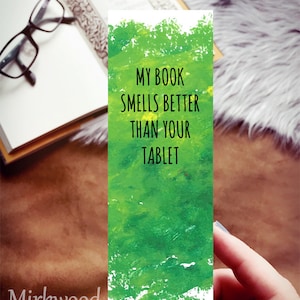 May include: Green watercolor bookmark with the text "My book smells better than your tablet".