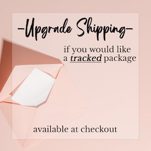 May include: A pink envelope with a white card inside. The text on the image reads "Upgrade Shipping - if you would like a tracked package available at checkout."