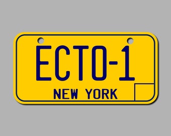May include: Yellow license plate with blue text that reads "ECTO-1" and "NEW YORK".