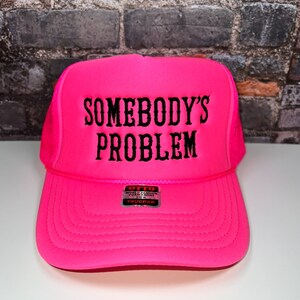 Somebody's Problem Embroidered Trucker Hat main image 1