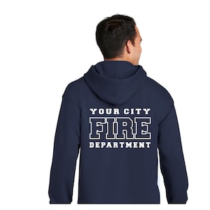 May include: A navy blue hooded sweatshirt featuring white block lettering on the back that reads YOUR CITY FIRE DEPARTMENT. The garment includes a hood, long sleeves, and a standard fit, displaying the text clearly across the upper back area.