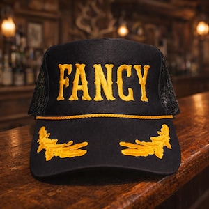 FANCY Embroidered Trucker Hat