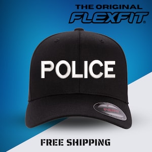 May include: Black Flexfit baseball cap with a white embroidered "POLICE" logo. The cap has a black brim and a black adjustable strap.