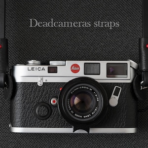 Bandoulière en cuir noir au look vintage par Deadcameras - Utilisation épaule/cou