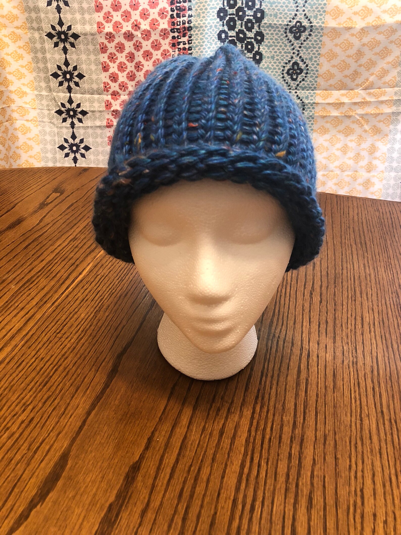 Interesting light blue hat with orher colors in it. Etsy