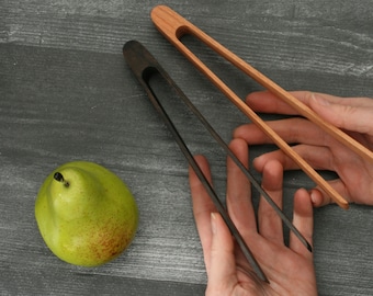 Wooden toaster tongs with magnet and handmade in black cherry wood. Natural or ebony stained.