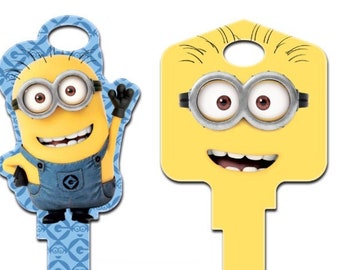 Minion-Form oder Minion-Gesichtauswahl zwischen (1) großem gemaltem ungeschnittenem Hausschlüsselrohling Auswahl an Kwikset- oder Schlage-Schlüsselnuten.    Auslaufmodell