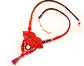 orange lips bib necklace, orange leather lips and tassels pendant on multicolor beads adjustable necklace, throat chakra, surreal jewelry