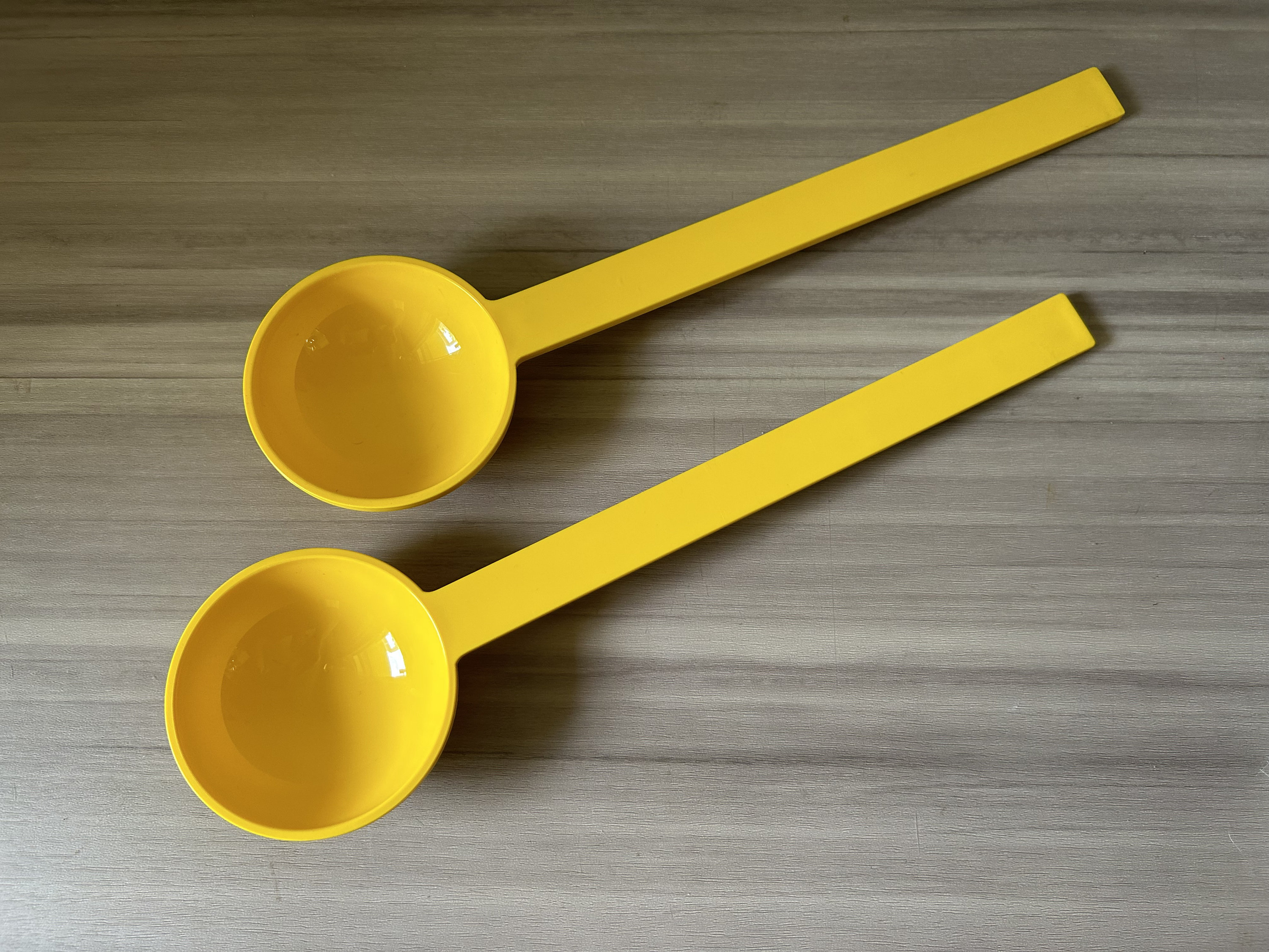 Vintage Dansk plastic spoon designed by Gunnar Cryan yellow melamine salad utensil