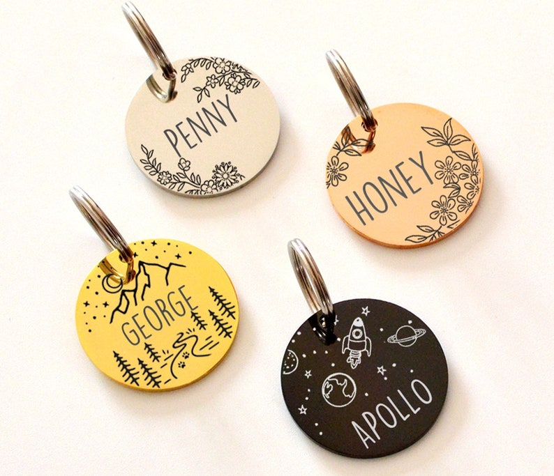 Four personalized pet tags