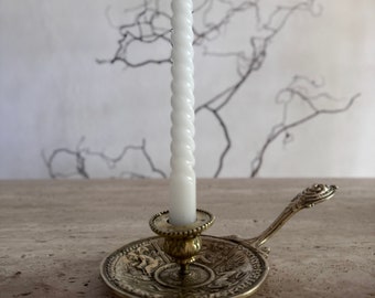 French antique brass candlestick holder with a circle of woman.