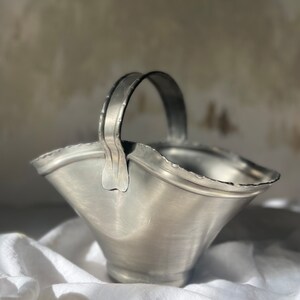 Fait à la main, handmade pewter basket.