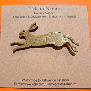 Hare pin/badge