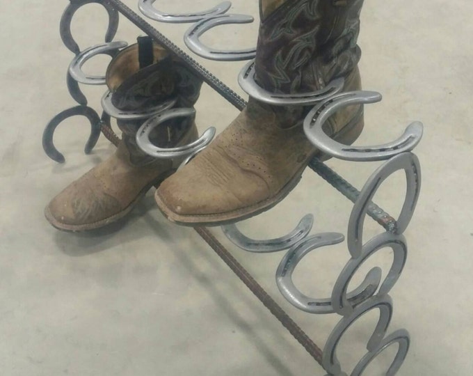 Horseshoe boot rack