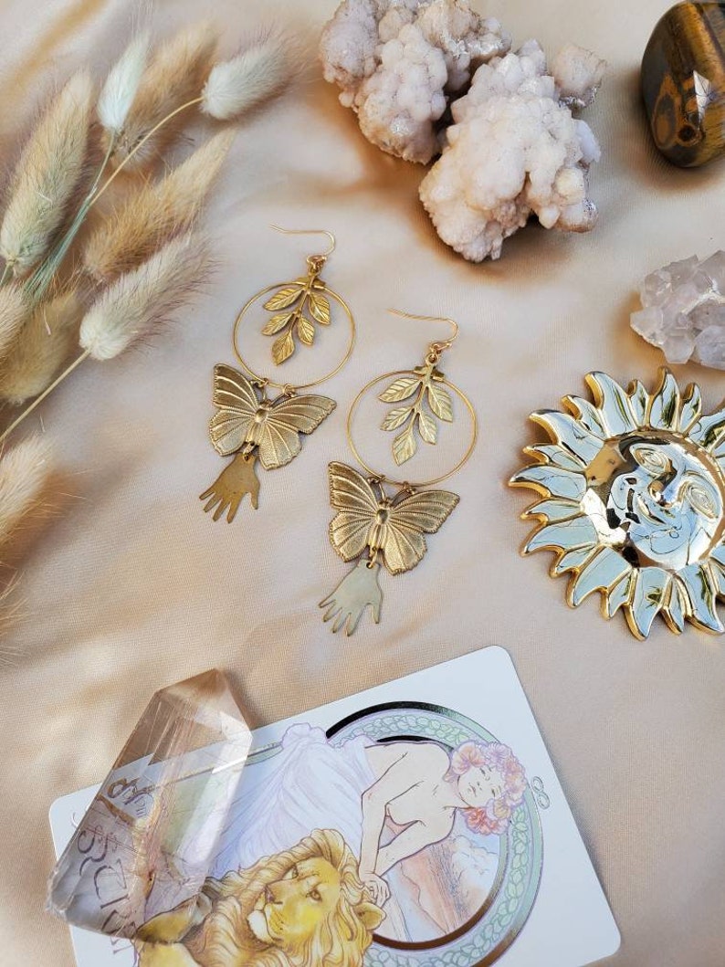 Gold Butterfly Nature Goddess Hoop Earrings Irene Gold Botanical Hand and Butterfly Hoop Earrings