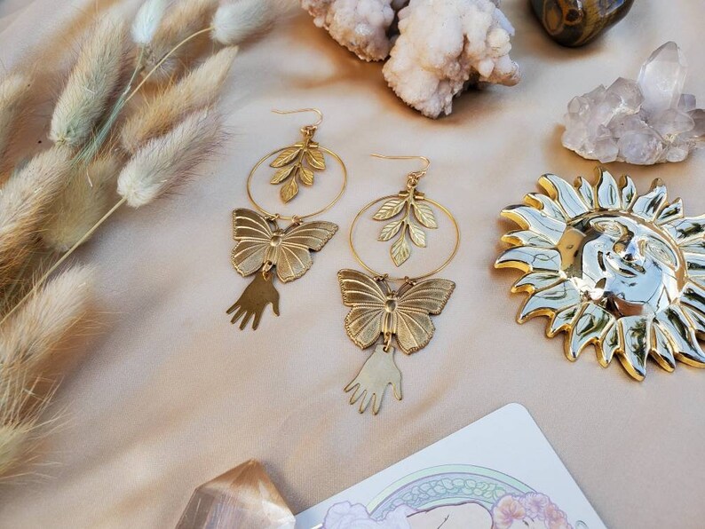 Gold Butterfly Nature Goddess Hoop Earrings Irene Gold Botanical Hand and Butterfly Hoop Earrings