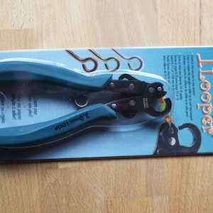 May include: A blue and black 1-step Big Looper beading tool for making 3.0 mm loops. The tool is packaged on a blue and orange card with the brand name Beadsmith.