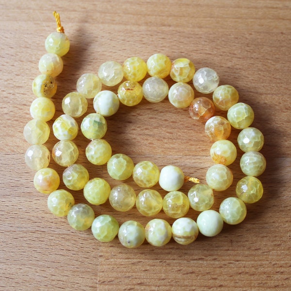 Fire Agate 8-8.3mm Faceted Round Beads - Full Strand