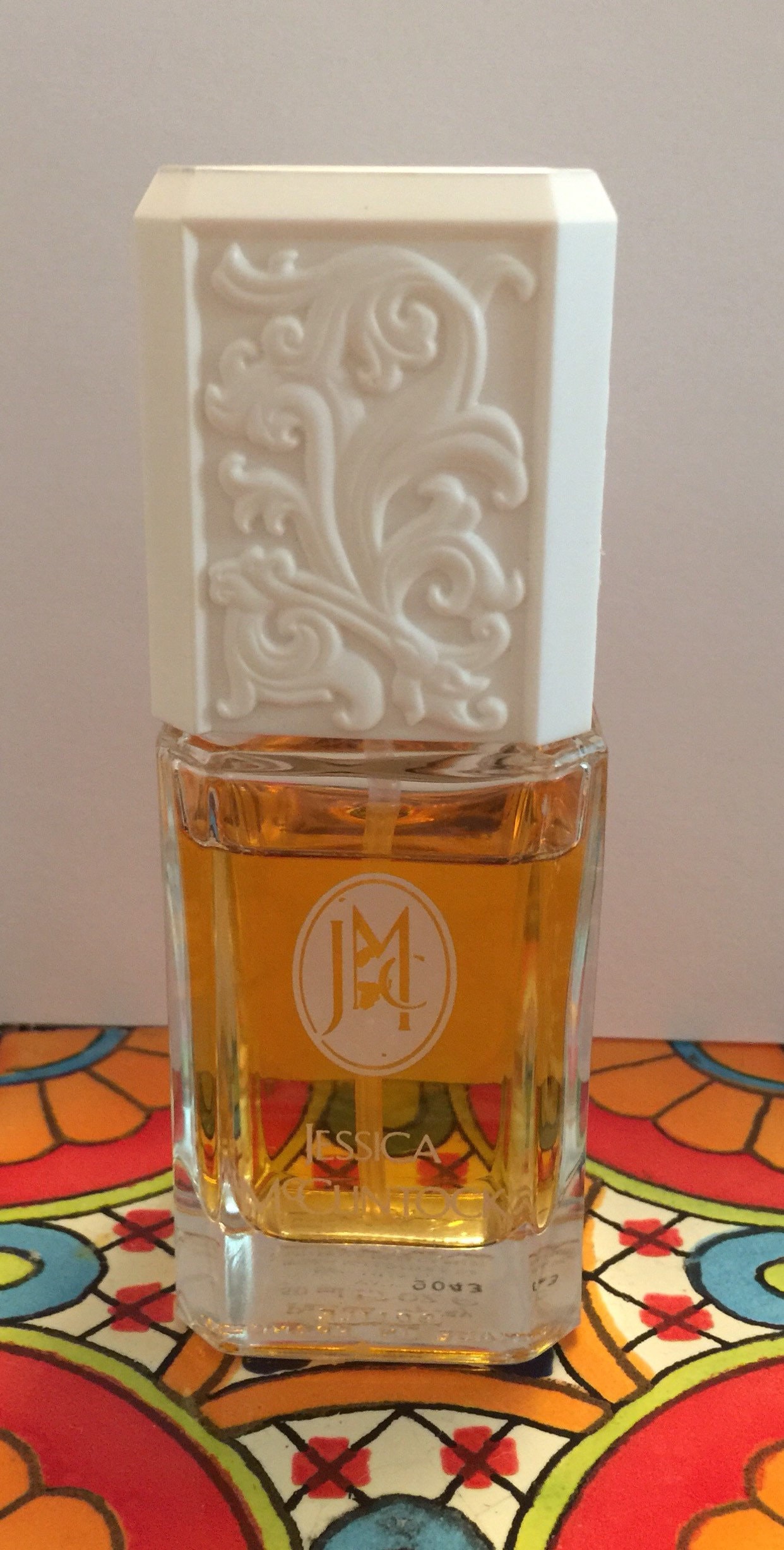 Sold at Auction: An Eau de Parfum maked Chamele No.5, 50 ml, a Perfumed  Body Powder Marked Jessica McClintock 56gm & Portable perfume marked Joie  10ml