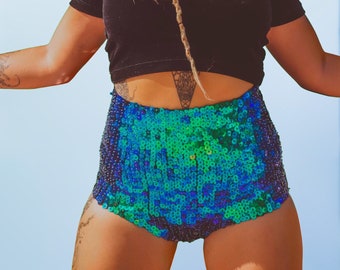 Emerald green handmade sequin shorts.