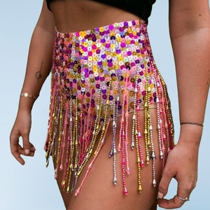 Booty shorts for women with pink sequins and beading. Perfect for festival outfit , sparkly rave wear and parties.