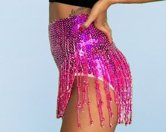 Hot pink sequin booty shorts for women. Perfect festival outfit or sparkly rave wear.