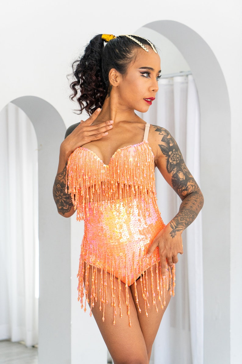 Sunset orange sequin booty shorts. Perfect for festival outfit and sparkly rave wear. Great for pole dance wear and burlesque costume. image 4