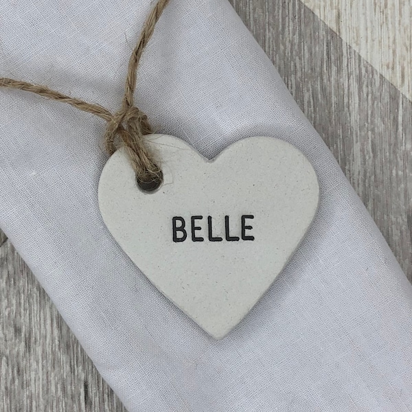 Personalised wedding favours, wedding place names, heart tags, personalised clay tags, table decorations, napkin rings, wedding keepsake.