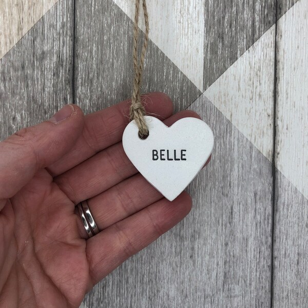 Personalised wedding favours, wedding place names, heart tags, personalised clay tags, table decorations, napkin rings, wedding keepsake.