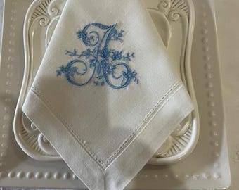 Four personalized hemstitched embroidered linen dinner napkin | with single floral initial 1 color.