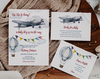 May include: A set of three baby shower invitations featuring a watercolour illustration of a hot air balloon and aeroplane. The invitations are for a baby boy and include the text "Up, Up & Away! A baby boy is on the way." and "Books for baby." and "Diaper Raffle."