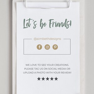 May include: A white sign with the text "Let's be Friends!" and the social media handle "@aimbethdesigns". The sign also includes icons for Facebook, Instagram, and Pinterest.