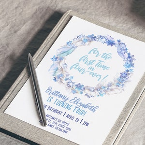 May include: A blue and white watercolor wreath with snowflakes and feathers surrounds the text "for the first time four-ever!"  The text "Brittany Elizabeth is turning four!" is below the wreath. The text "is Saturday | April 20 | 2PM" is below that. The text "Brittany's Ice Castle" is below that. The text "H St., City, State 12345" is below that. The text "PS Aimee 123.456.7890" is below that. The text "Aim Beth" is at the bottom of the page.
