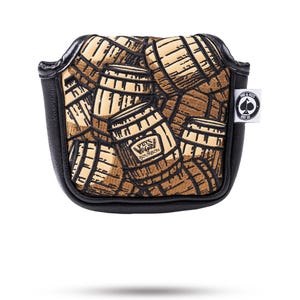 May include: Black golf club head cover with a brown barrel pattern. The cover has a black border and features the text "Pits & Aces Bourbon". A small tag with a spade logo is attached.