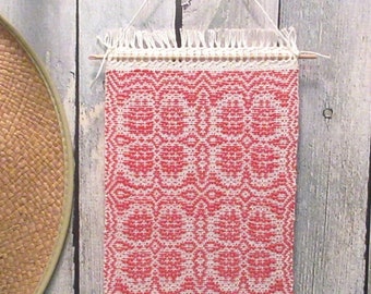 Small red and white handwoven wall hanging room decor woven in a twill pattern. Hand woven mini wall hanging is 6.5" by 19" total length