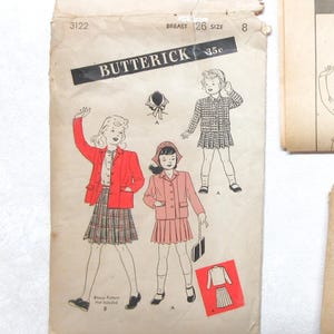 1940s girls size 8 suit, jacket and hat pattern. Uncut Butterick 3122 with instruction sheet and 12 un-printed pattern pieces.