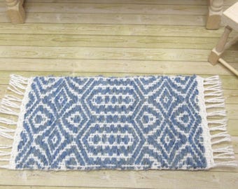 Handwoven 12th scale dollhouse rug: Blue wool and white cotton in a twill pattern. 4.75x2.25"