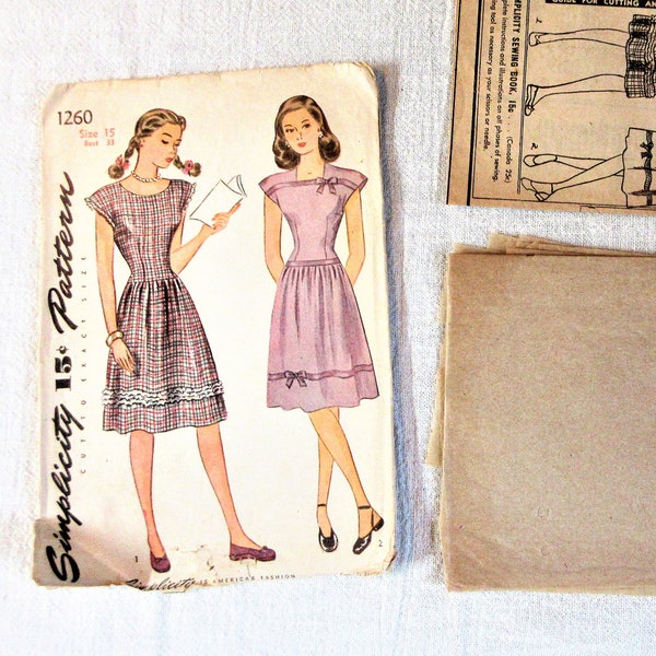 1940s Girls Dress Pattern Size 15 Junior Miss. Simplicity #1260 from 1944 with instruction sheet and 5 unprinted pattern pieces. Complete.