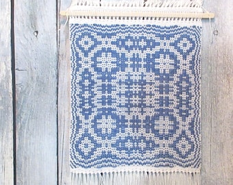 Handwoven wall hanging. Small blue and white traditional weaving in Lovers Knot crackle weave. Small wall hanging is 10" by 20" total length