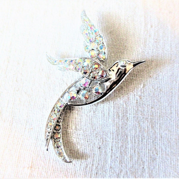 1960s Sarah Coventry Bird of Paradise Hummingbird Brooch with Aurora Borealis Rhinestones. Signed SARAH COV. 2 3/4" long. In good condition