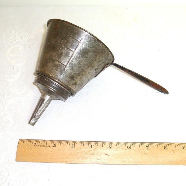 Vintage cooking tool, funnel. Measured 1 cup funnel. Reducer assembly for pouring to small openings. good condition with some surface rust